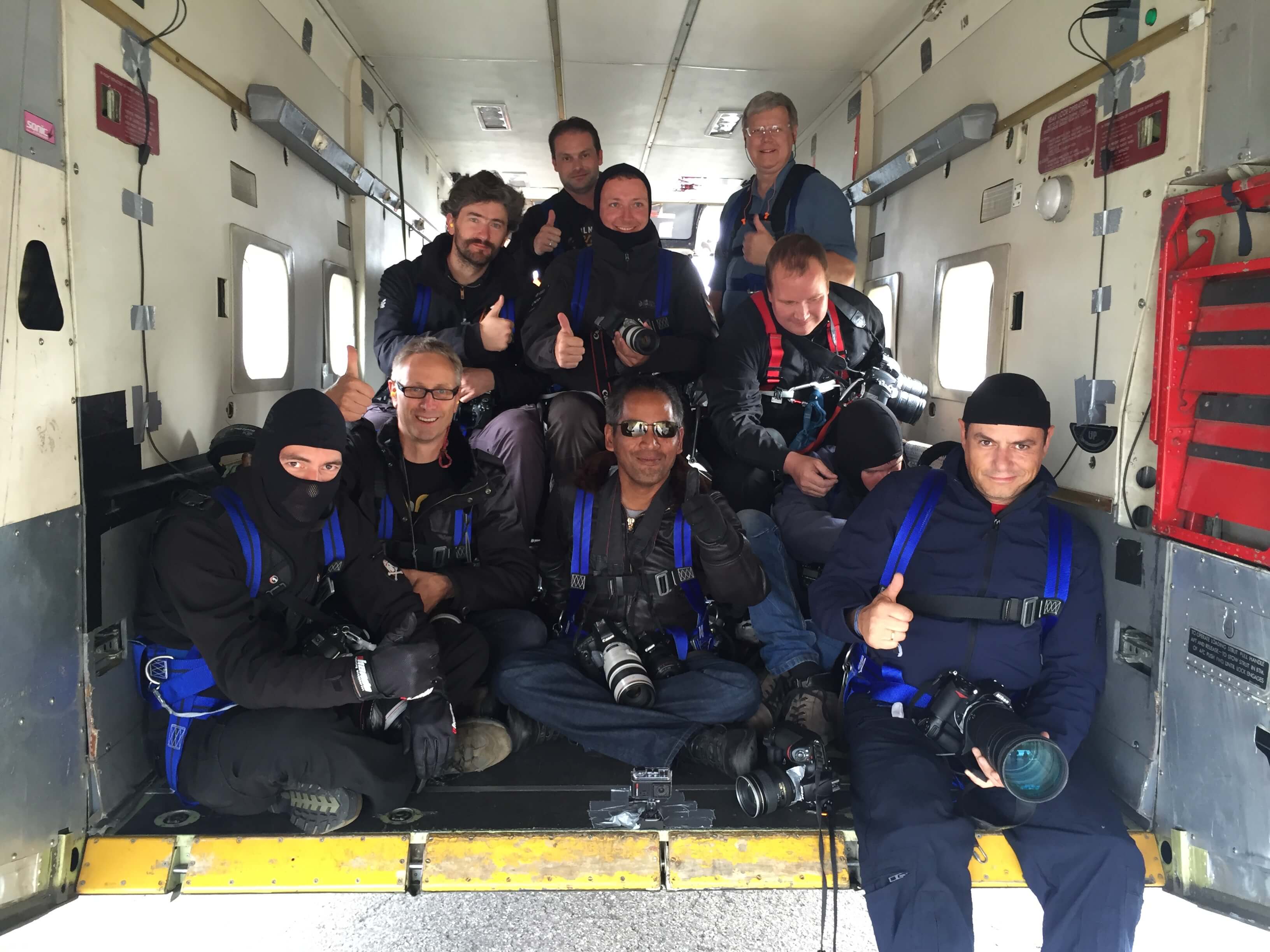 Alex in the back of a Cessna Skyvan, going up for an air to air shoot in Belgium