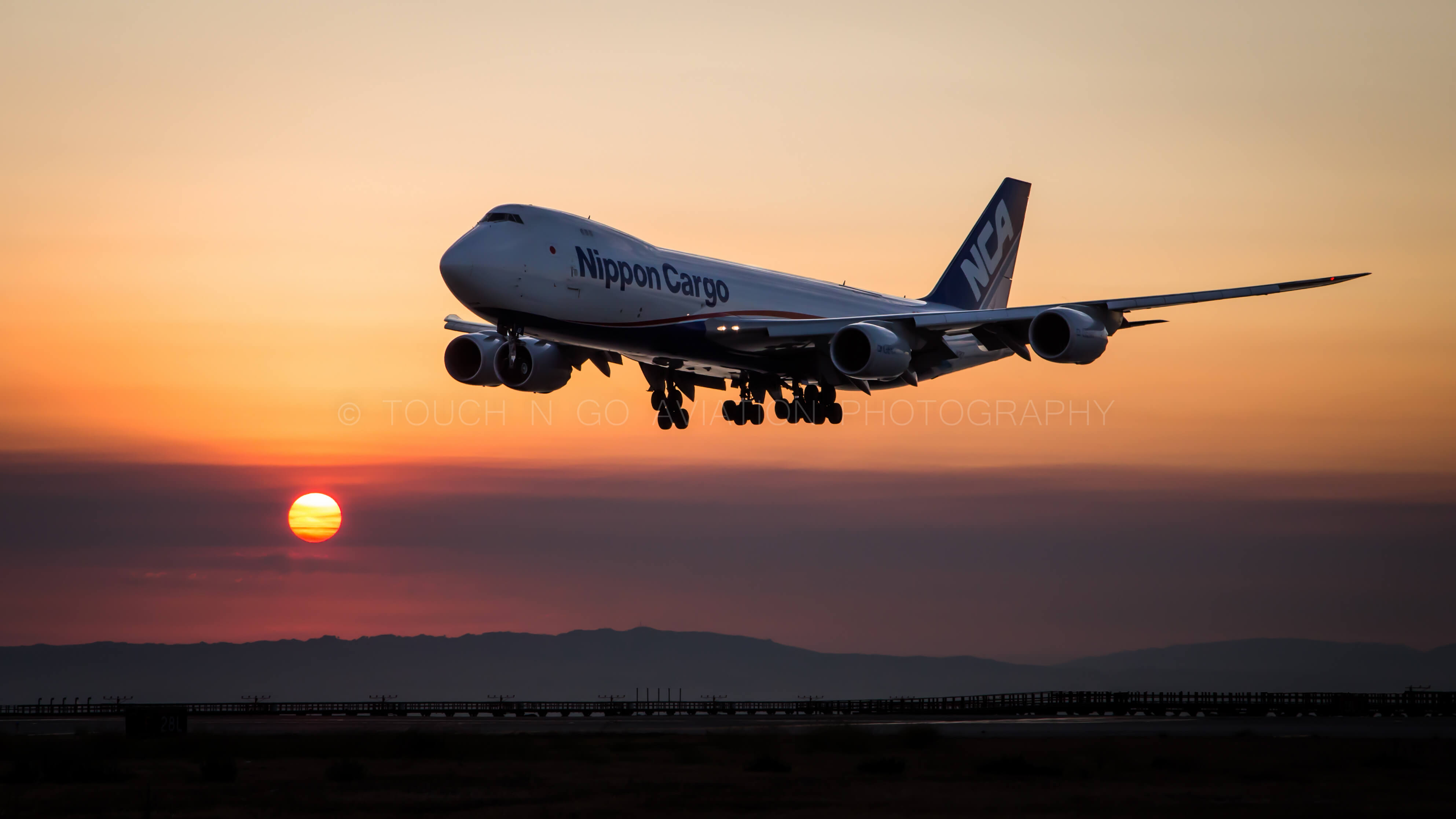 NCA arriving into SFO at sunrise.