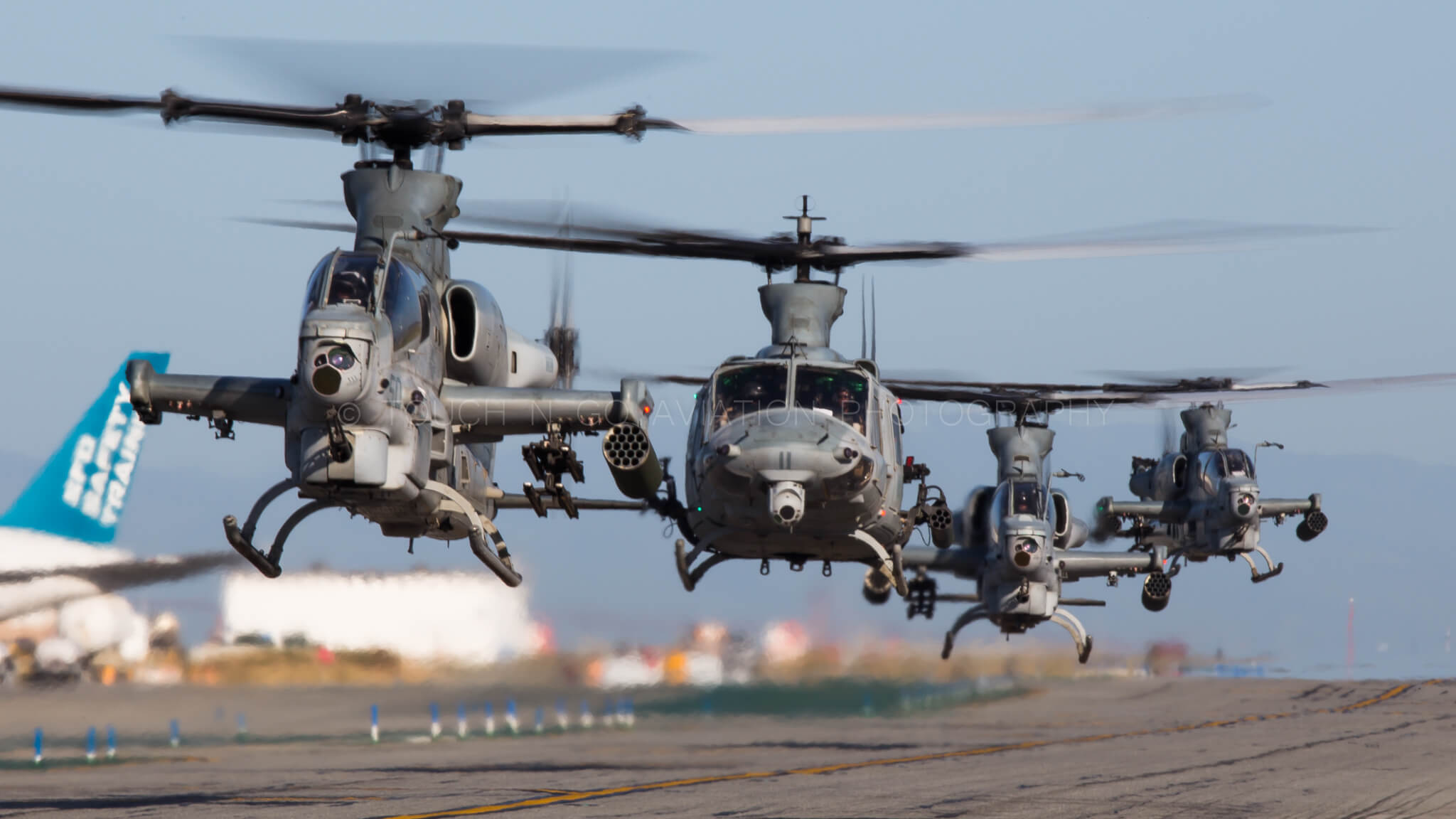 Marine squadron HMLA-13 taxiing to parking after arriving into SFO.