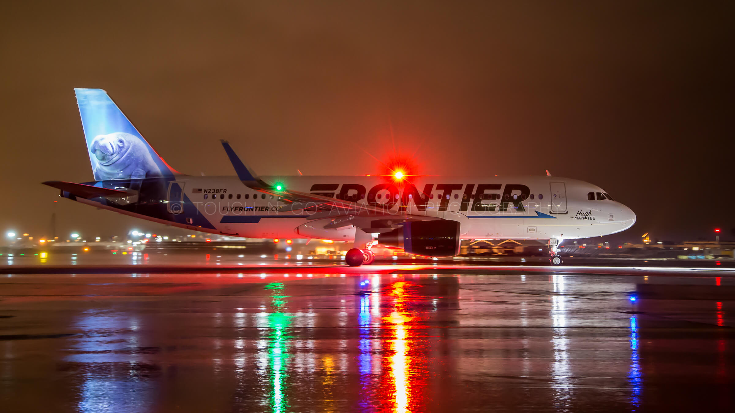 Frontier walrus early morning shot, making beautiful reflections on the wet pavement.