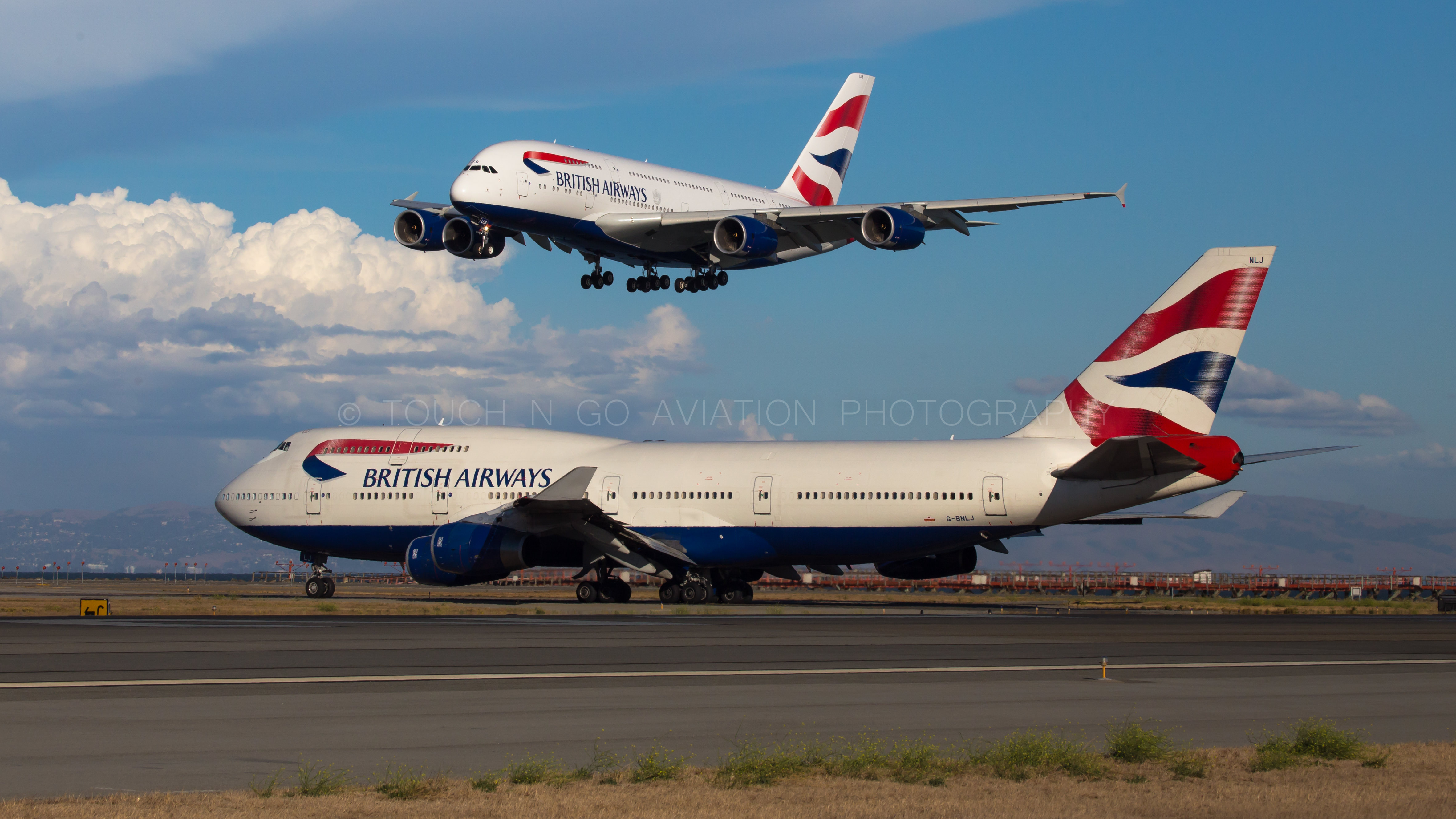 BA outbound 747 holds short for landing BA A380 in SFO.