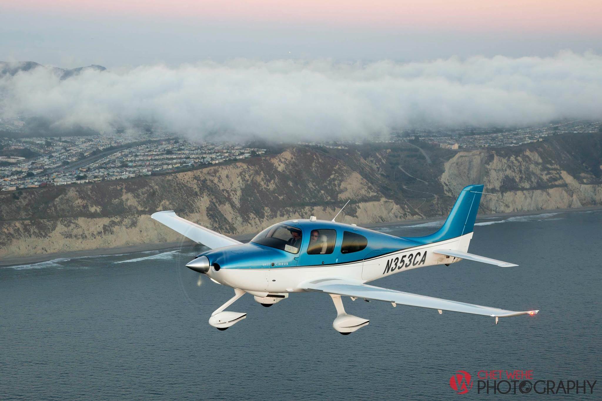 Air to air shot of Cirrus SR20 off the coast of SF