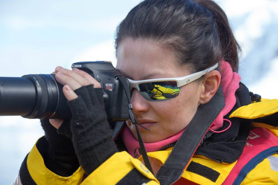 Tia taking photos in Antarctica.