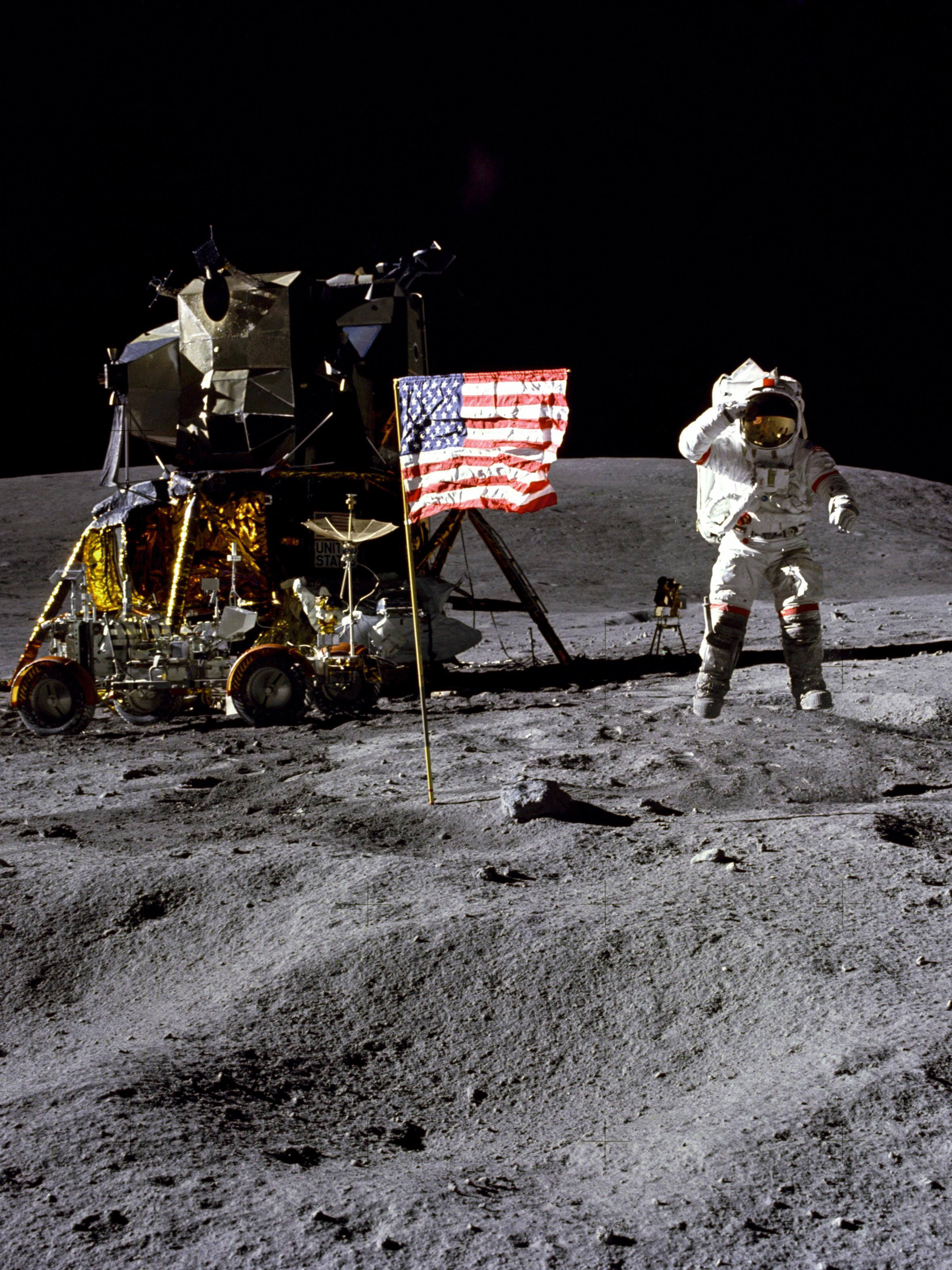 John Young salutes the US flag during the first Apollo 16 EVA