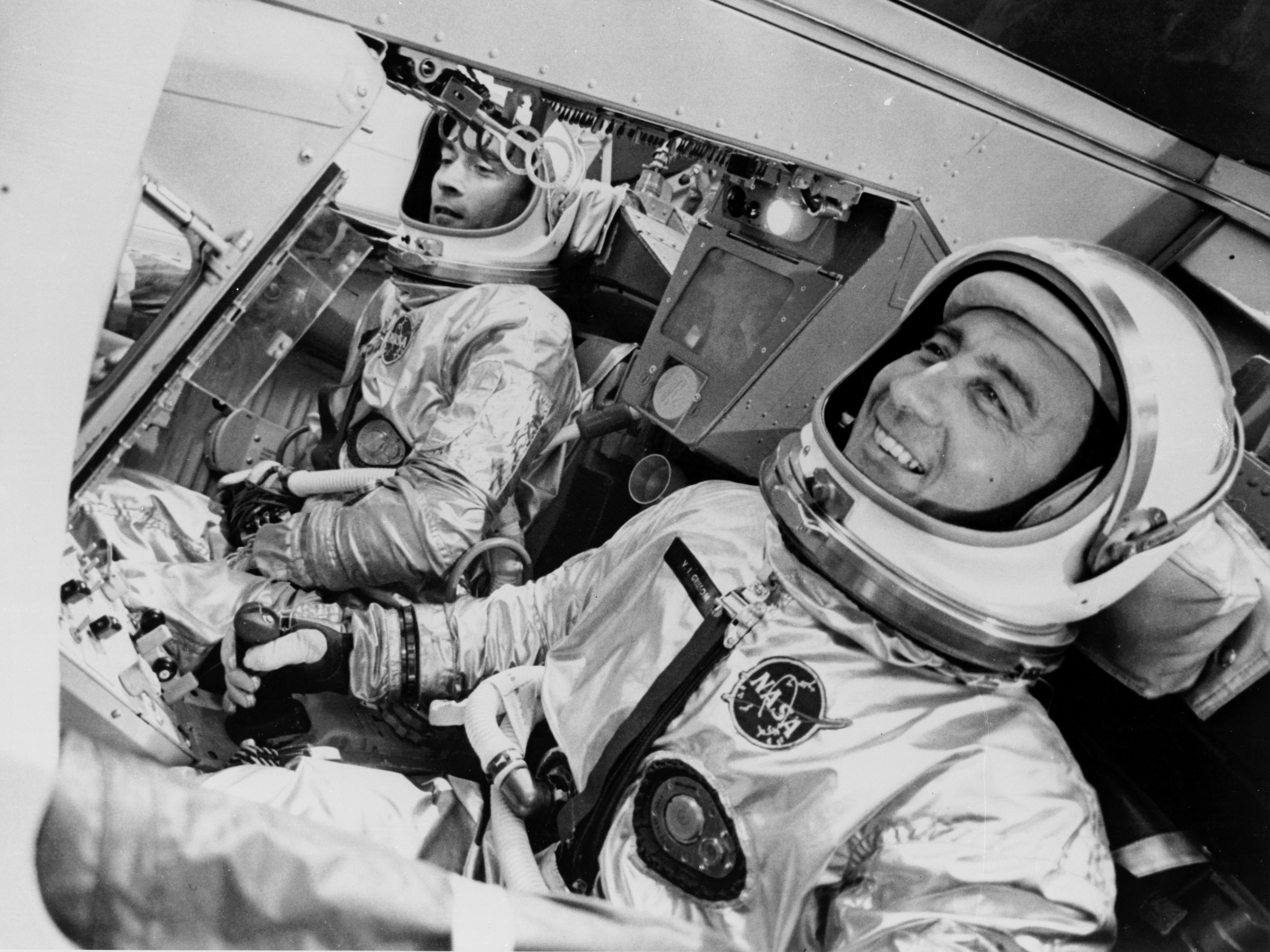 Gus Grisson and John Young in the spacecraft simulator